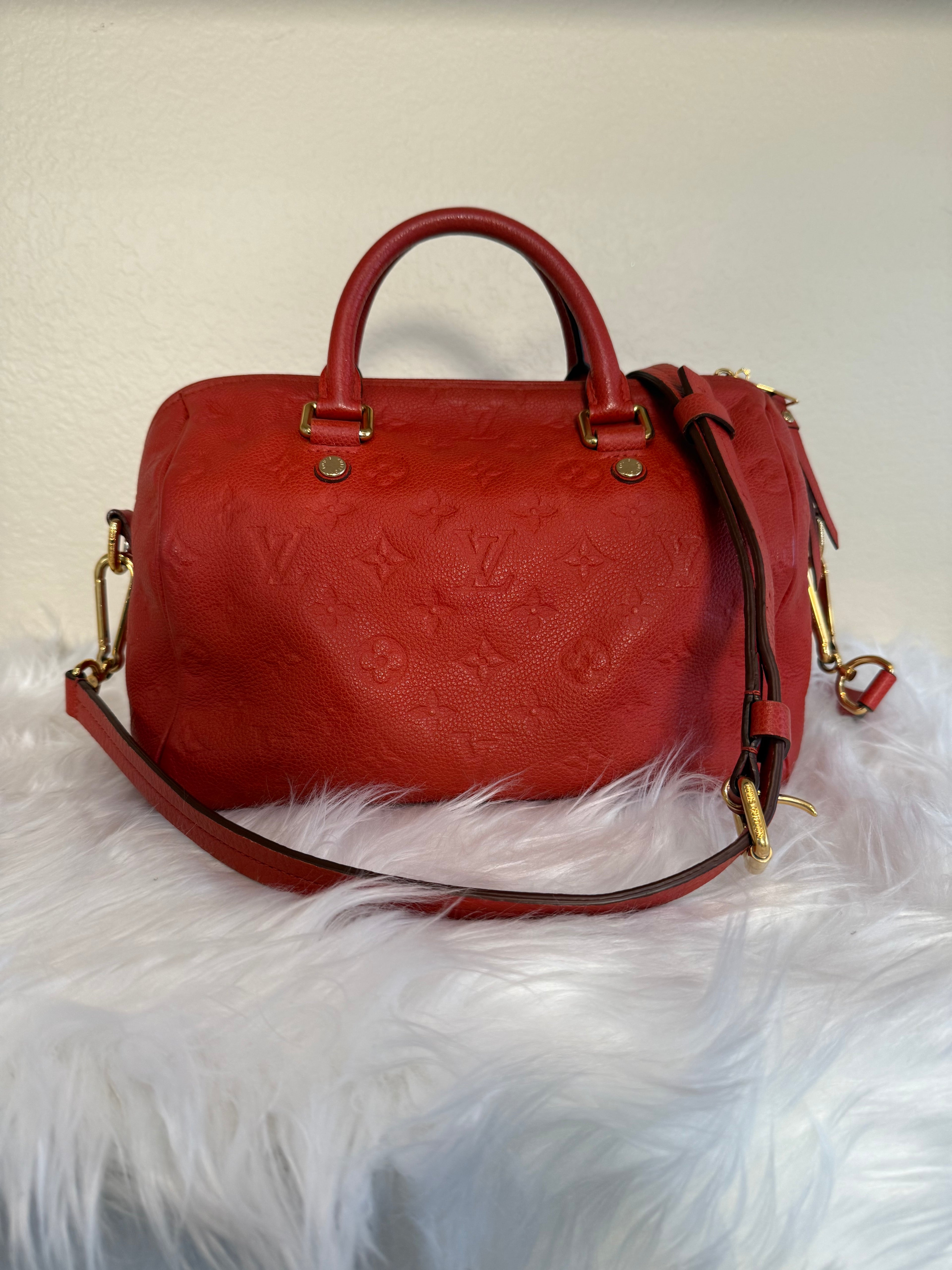 Louis Vuitton Speedy Bandoulière 25
Red Monogram Empreinte Leather Crossbody Bag